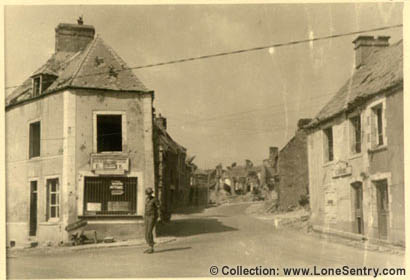 [U.S. Military Police direct traffic in French town during WWII]